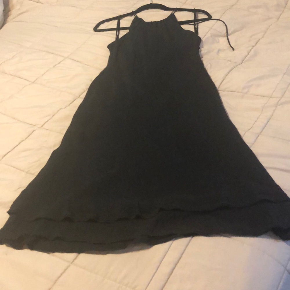 Little black with flirty ruffle two-tiered hem.